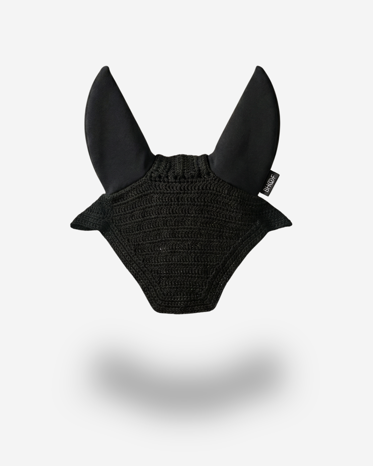 Black horse ear bonnet on a light gray background