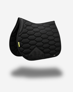 Black quilted saddle pad on a light gray background