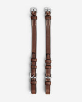 Pair of brown leather straps with silver buckles on a white background