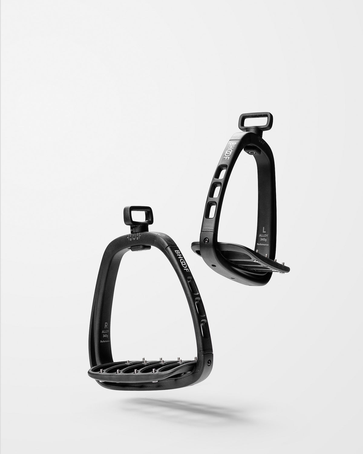 Two black stirrups on a white background