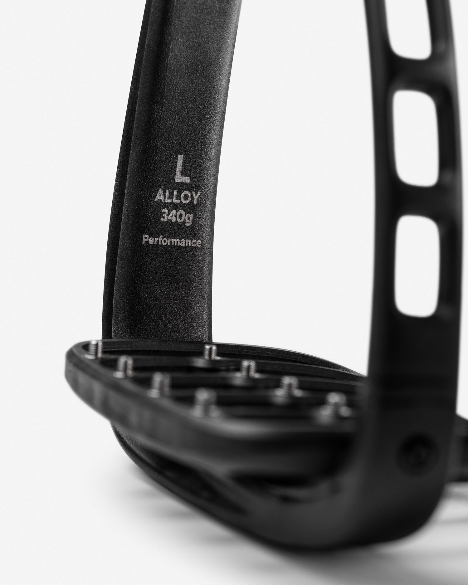 Close-up of a black stirrup with 'Alloy' and '340g' text on a white background